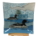 Two loons on a blue background small glass plate